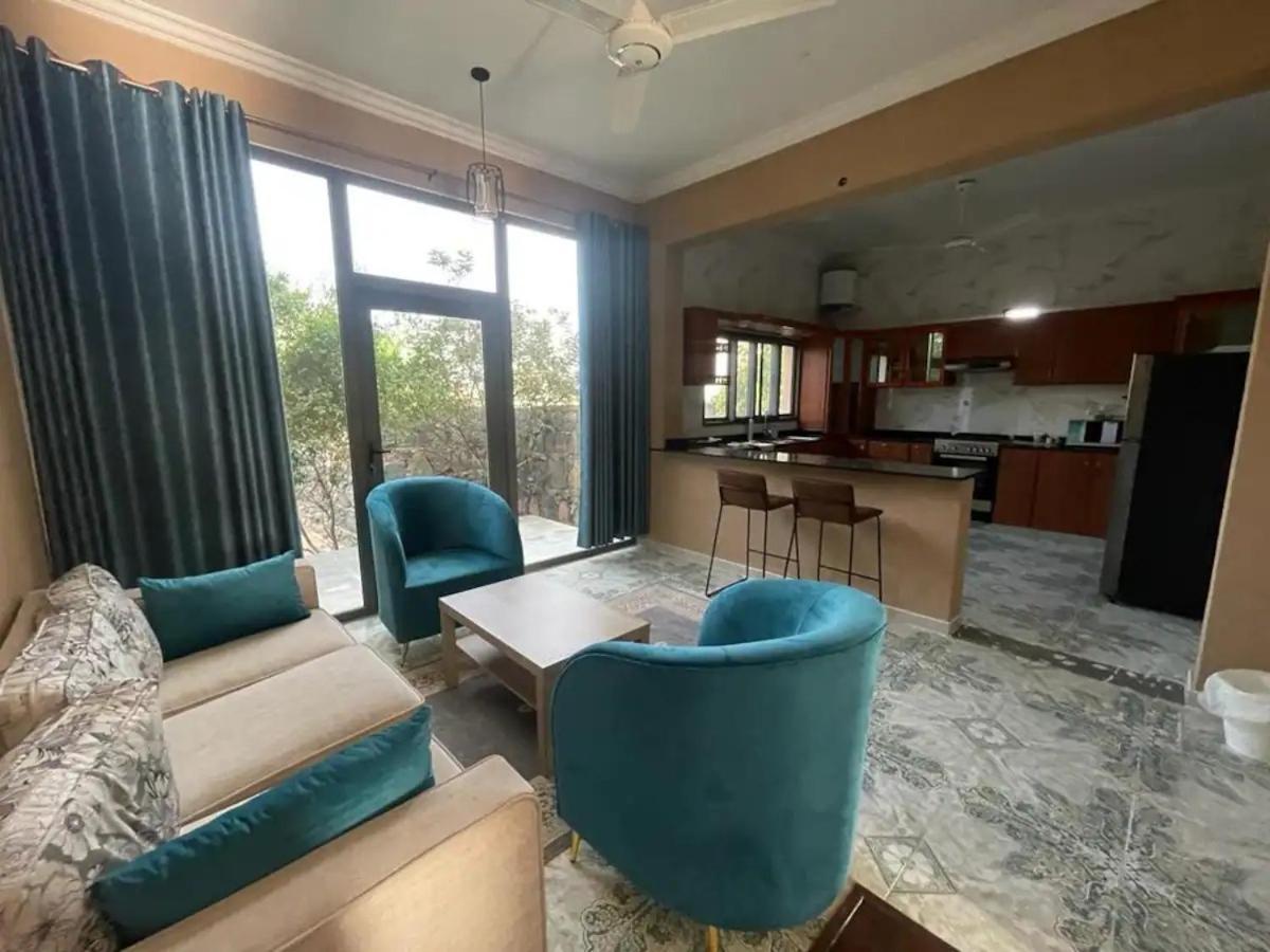 Rose Guesthouse Al 'Aqar Exteriör bild