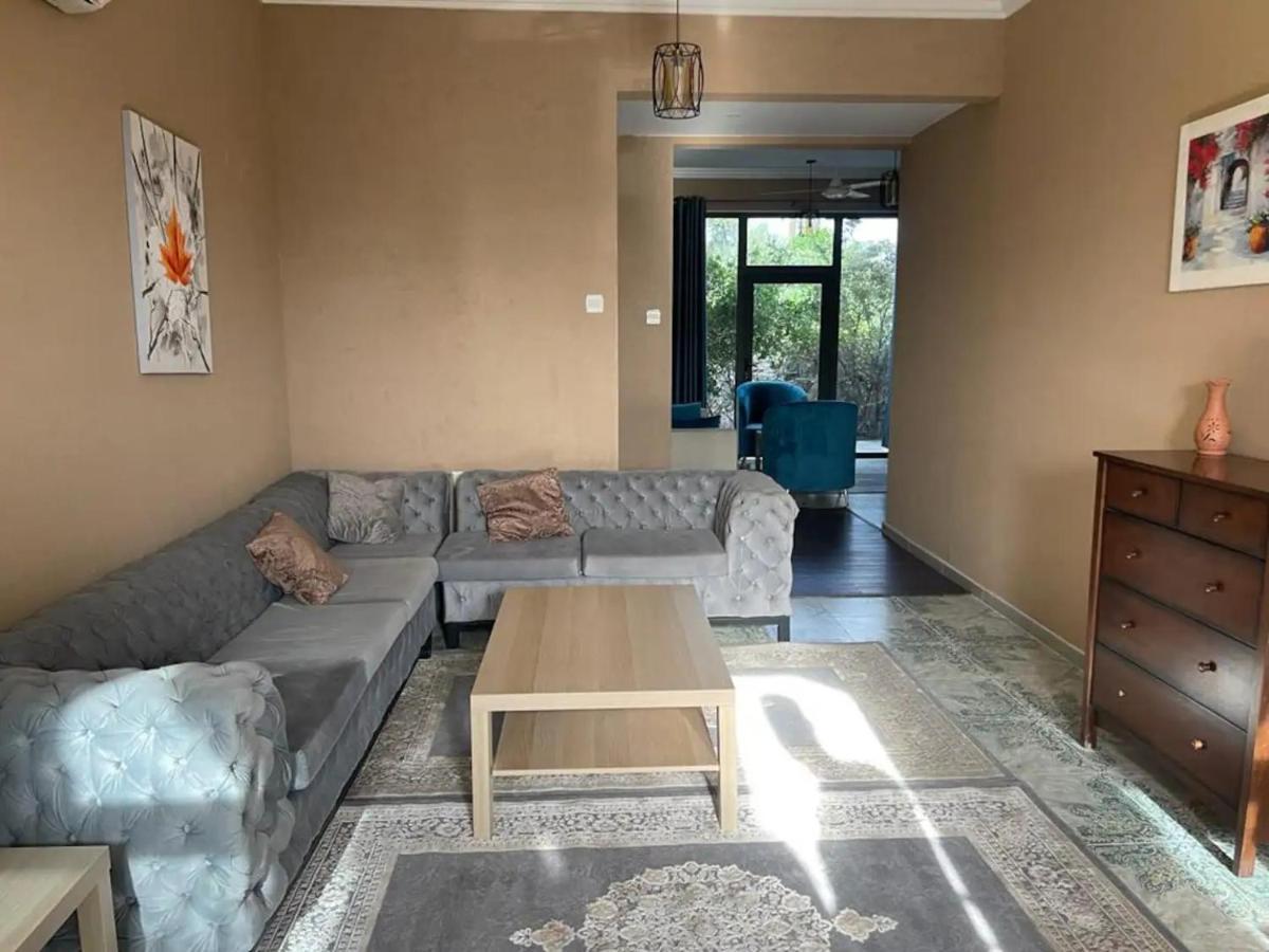 Rose Guesthouse Al 'Aqar Exteriör bild