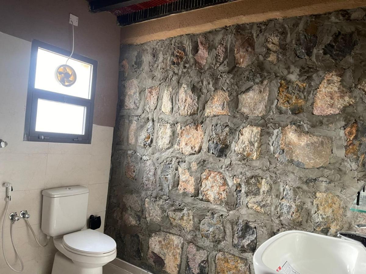 Rose Guesthouse Al 'Aqar Exteriör bild